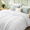 imageBedsure Cooling Cotton Waffle Weave Throw Blanket  Lightweight Breathable Blanket of Rayon Derived from Bamboo for Hot Sleepers Luxury Throws for Bed Couch and Sofa Ivory 50x70 InchesWhite
