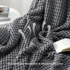 imageBedsure Cooling Cotton Waffle Weave Throw Blanket  Lightweight Breathable Blanket of Rayon Derived from Bamboo for Hot Sleepers Luxury Throws for Bed Couch and Sofa Ivory 50x70 InchesDark Grey