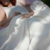 imageBedsure Cooling Cotton Waffle Weave Throw Blanket  Lightweight Breathable Blanket of Rayon Derived from Bamboo for Hot Sleepers Luxury Throws for Bed Couch and Sofa Ivory 50x70 InchesIvory