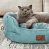 imageBedsure Self Warming Cat Bed  Round Cat Beds for Indoor Cats Washable Pet Bed for Puppy and Kitten with SlipResistant Bottom 20 Inches Self Warming Grey NonElectricWashed Blue